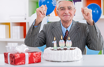 Elderly man celebrating birthday