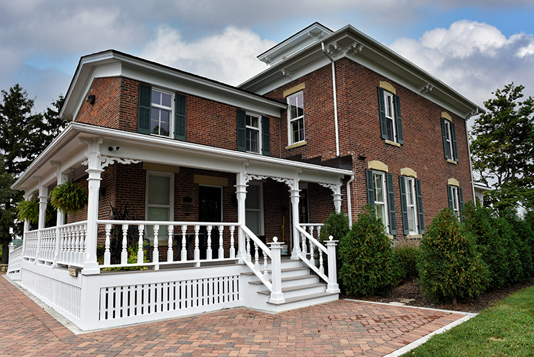 GENEVA, ILLINOIS - SEPTEMBER 9, 2016: History Gallery and Gift Shop and Key Garden at the Peck Farm Park Interpretative Center, a 385 acre natural retreat.